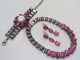 Ruby Crystal Three Piece Set Encased in an Antique Bronze Metal Setting