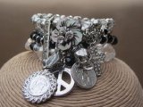 Silver Beaded Crystal and Pearl Five Strand Bracelet with A Collection of Charms