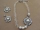 Clear Crystal and White Faux Pearl Necklace with Oval Cut Crystal Side Pendant and Matching Oval Cut Crystal Earrings